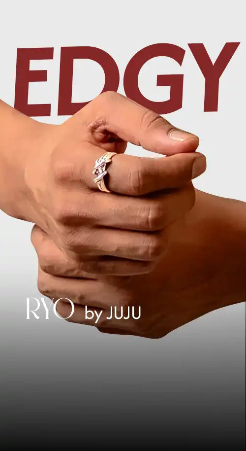 A person’s hands modeling a ring.